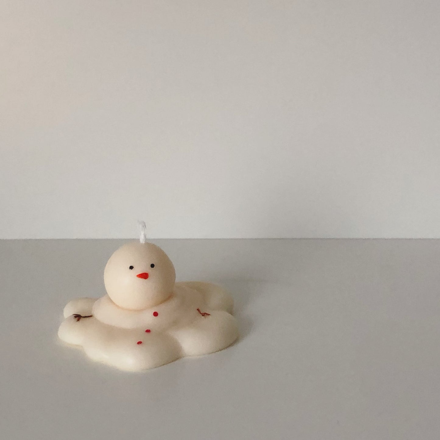 Melting Snowman Candle